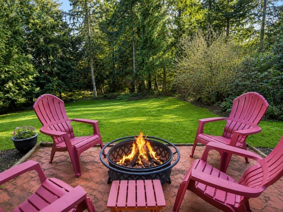 Enjoy evenings around the fire pit sharing stories beneath the stars and towering evergreens