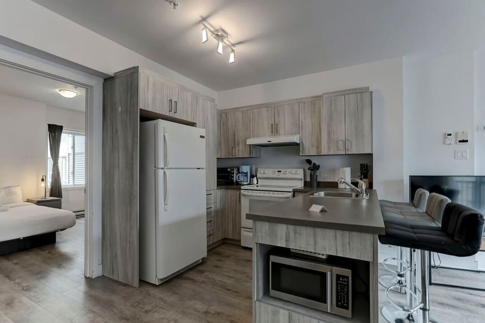 Open-concept kitchen and living space, blending comfort and convenience for an enjoyable stay.