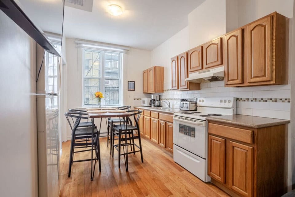 Kitchen: Bright eat-in kitchen with full appliances, natural light, and plenty of prep space