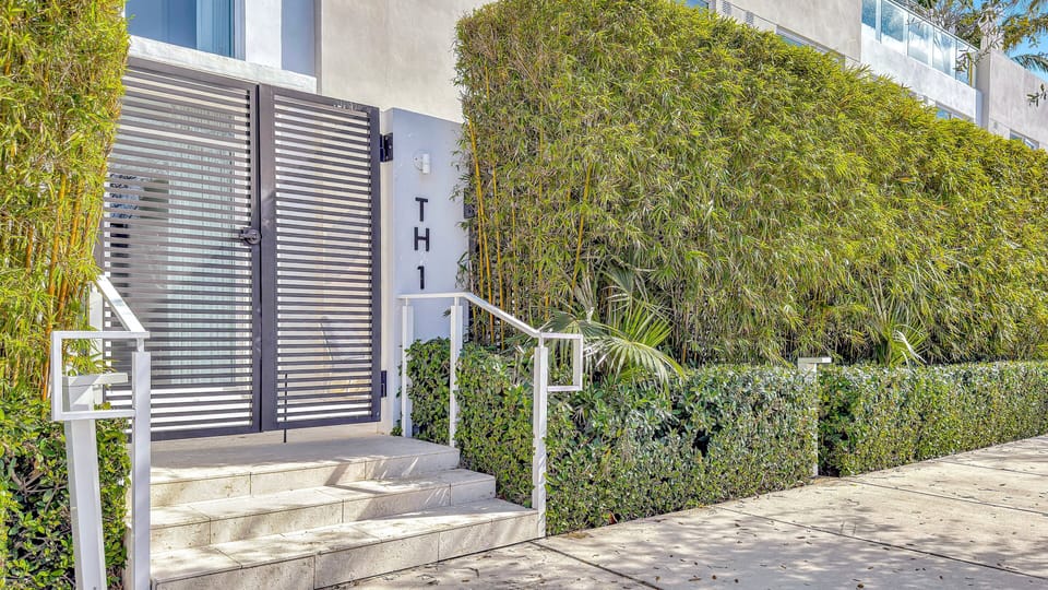 Exterior | Front of townhome, secure + private.