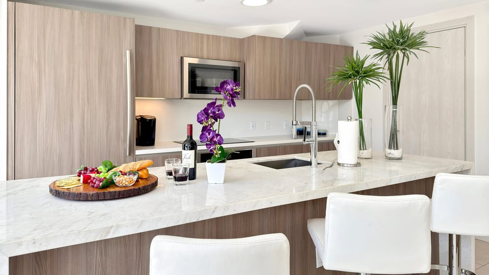 Kitchen | Modern appliances + counter seating.