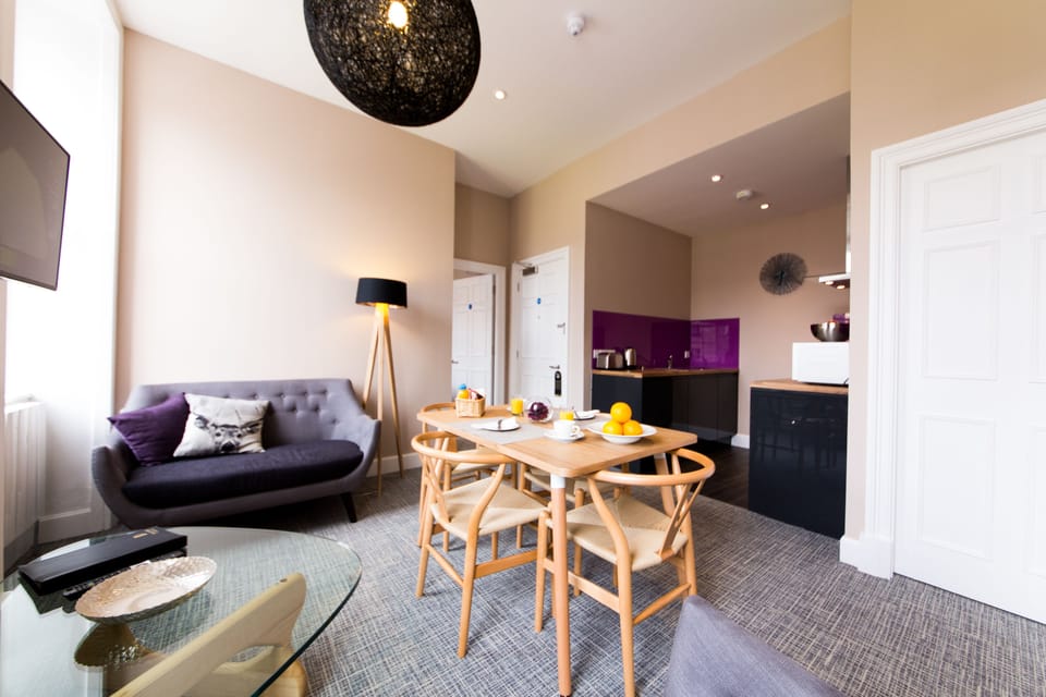 Apartment, 1 Bedroom, Kitchen | Living area | 32-inch flat-screen TV with digital channels, TV, iPod dock