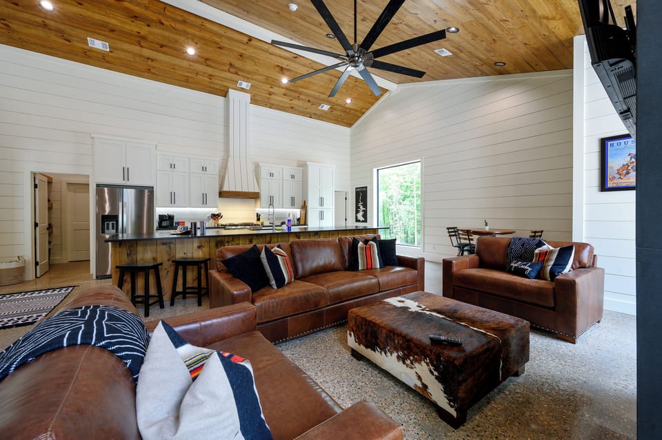 Rustic-modern open living room and kitchen with spacious charm.