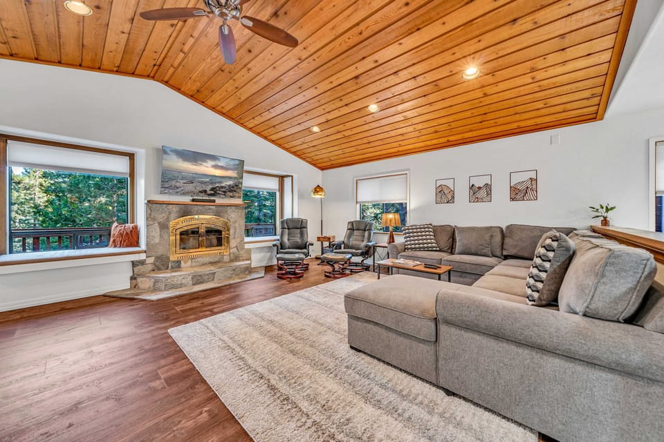 Living room: Smart TV, wood-burning fireplace, central heating, no A/C
