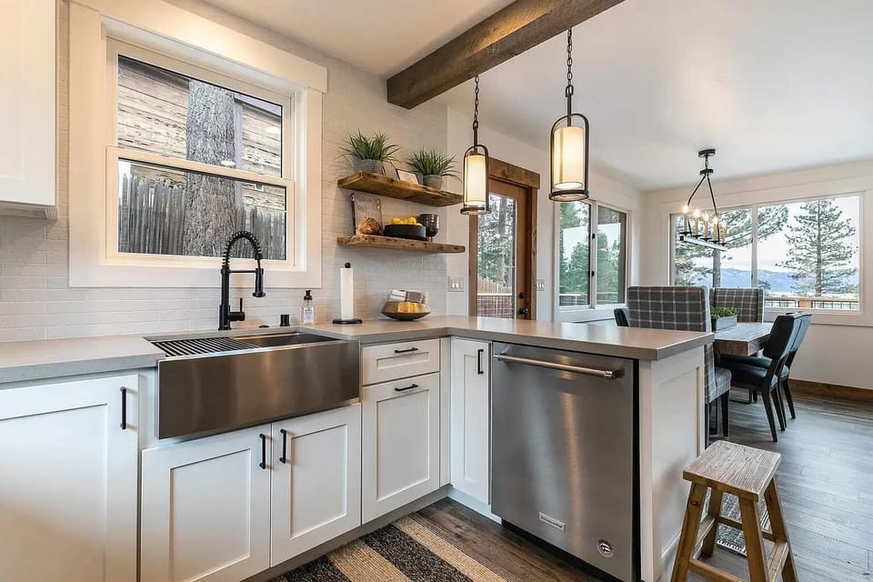 Kitchen: Keurig, toaster, drip coffee maker,  cooking utensils, tableware, toaster oven