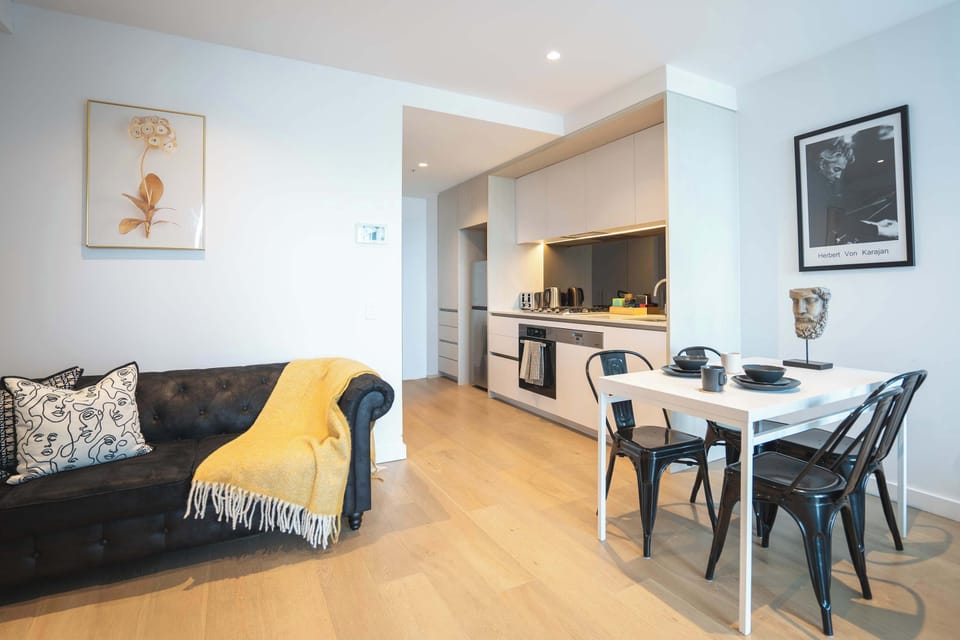 Inviting living area with dining table and spacious sofa