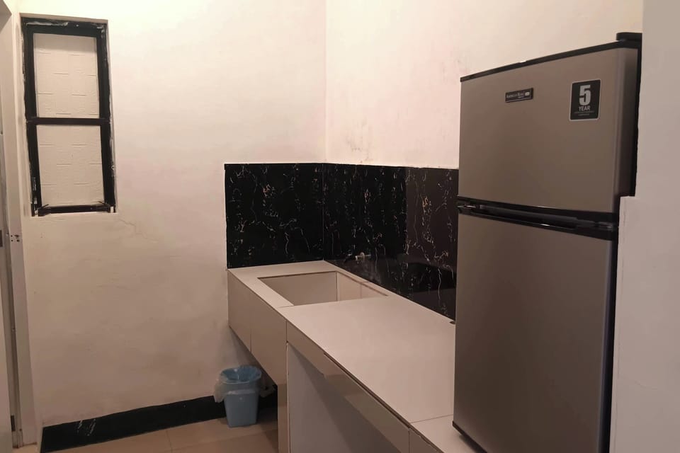 Family Room | Minibar, desk, free WiFi, bed sheets