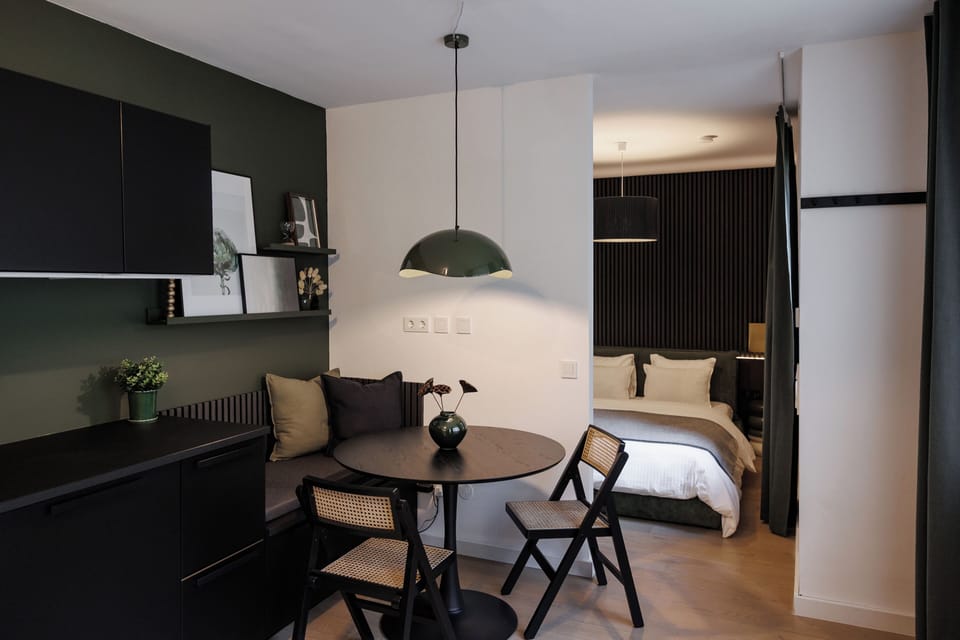 Luxury Apartment, Courtyard View | Living area | 42-inch Smart TV with cable channels, Netflix, streaming services