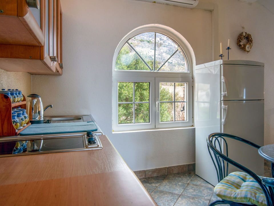 Wood, Interior Design, Flooring, Kitchen, Major Appliance, Floor, Furniture, Kitchen Appliance, Countertop, Room