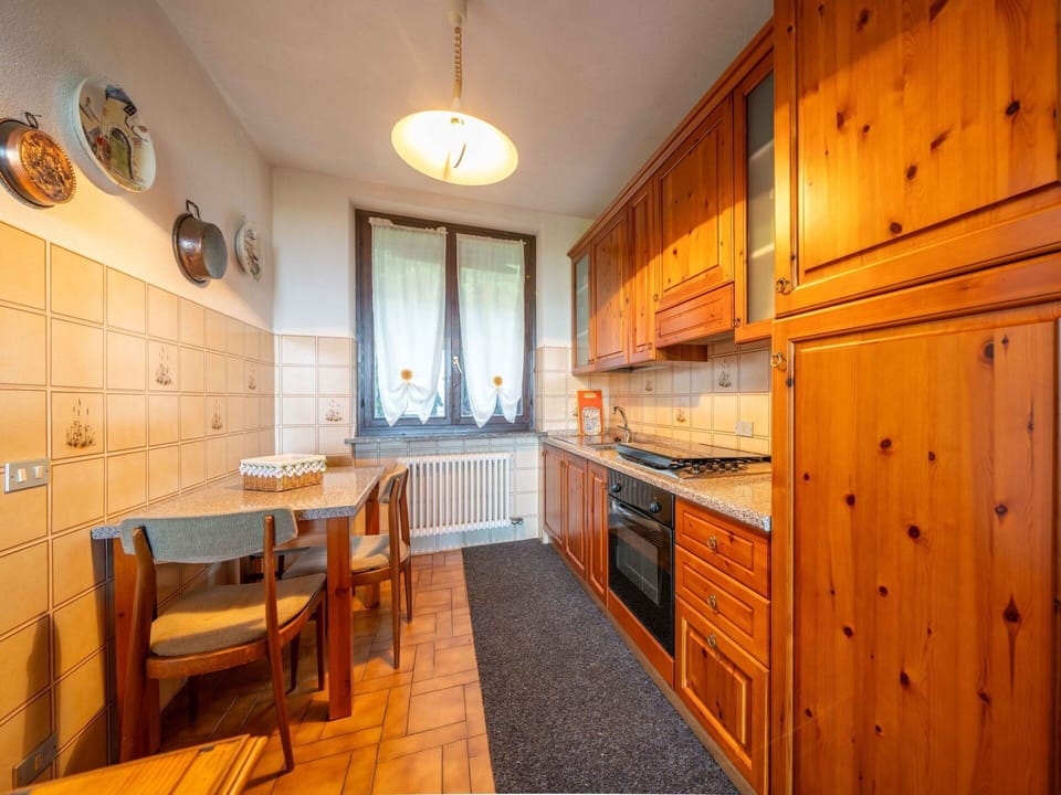 Furniture, Interior Design, Chair, Table, Dining Room, Kitchen & Dining Room Table, Flooring, Floor, Lighting, Room