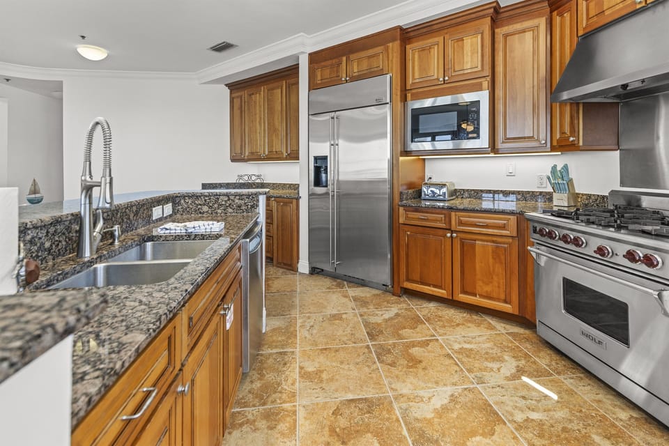 Cook like a chef in your fully equipped gourmet kitchen featuring granite countertops, stainless steel appliances, and all the tools you need for memorable meals.