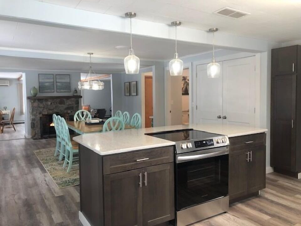 Kitchen/Dining Area - Brightly lit Kitchen facing towards Dining Area