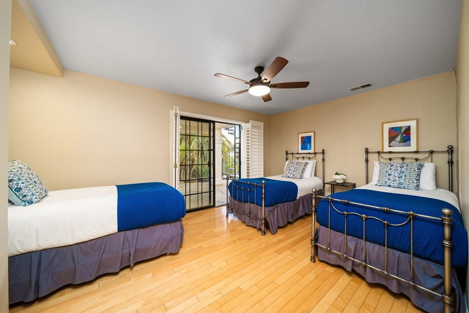 Guest Room w/ multiple beds. Perfect for families that need to be tougher but need separate beds.