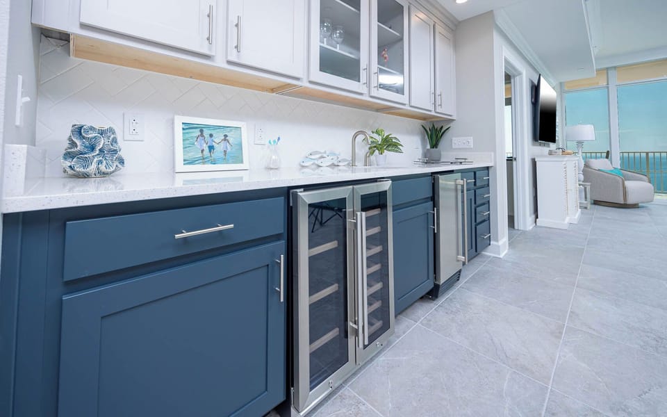 Grab a chilled bottle from the wine cooler or create your favorite cocktail at the wet bar