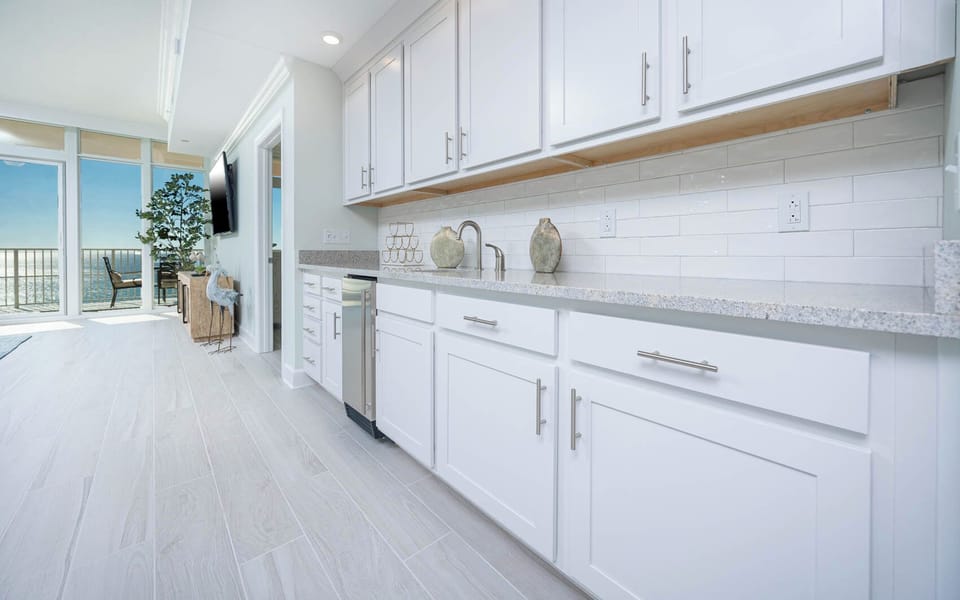 Grab a chilled drink from the fridge or create your favorite cocktail at the wet bar