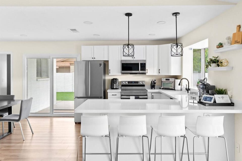 Cook, bake, and entertain with ease in the home’s roomy, well-equipped kitchen.”