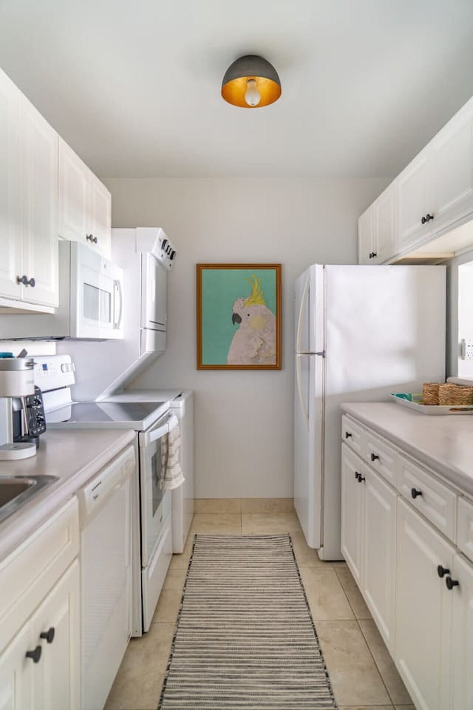 Fully equipped kitchen in second unit. Keurig and Nespresso machines with complimentary pods are provided. Full-size washer dryer, range, fridge, toaster, electric kettle, rice cooker, and a Vitamix blender in one of the units.