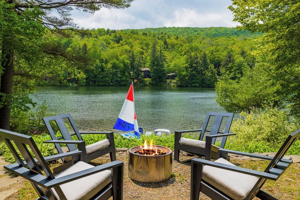 Adirondack chairs set for slow lakeside lounging