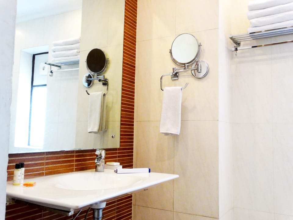 Shower, free toiletries, hair dryer, slippers