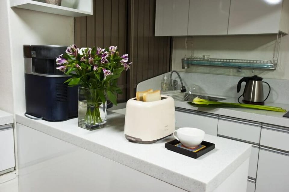 Mini-fridge, coffee/tea maker