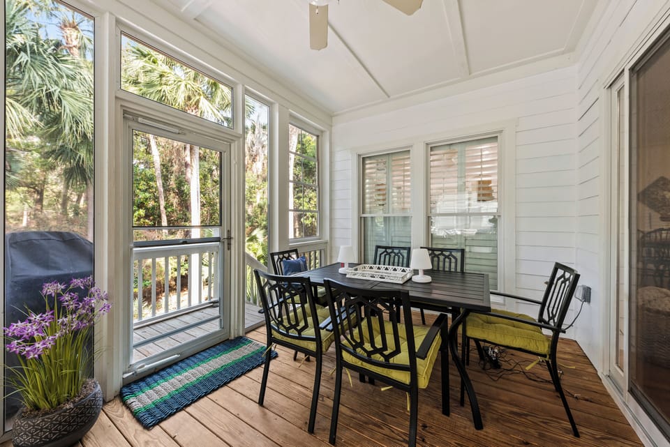 The Screened Porch / Outdoor Dining area protects you from bugs while you enjoy the island air.