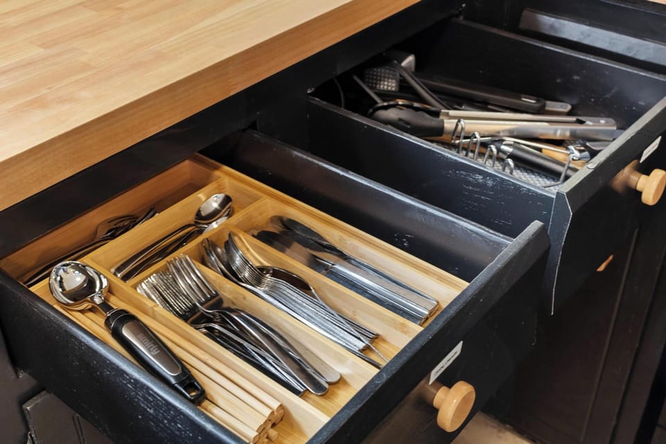 Dining and some cooking utensils provided in the full kitchen