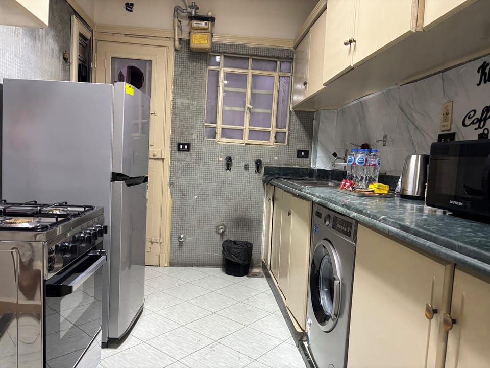 Family Apartment, Balcony, City View | Private kitchen | Full-size fridge, microwave, oven, stovetop