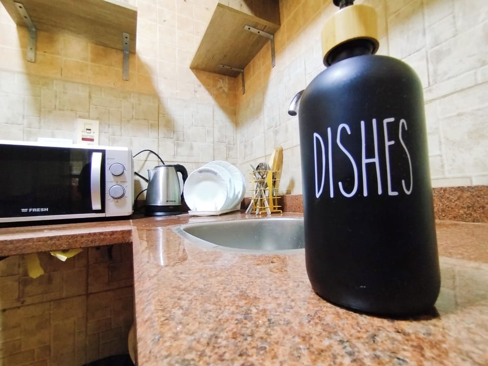 Family Apartment, Garden View | Private kitchen | Full-size fridge, microwave, oven, stovetop