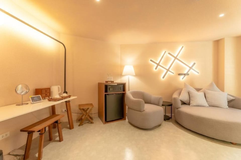 Suite Mountain View with bathtub | Living area | TV
