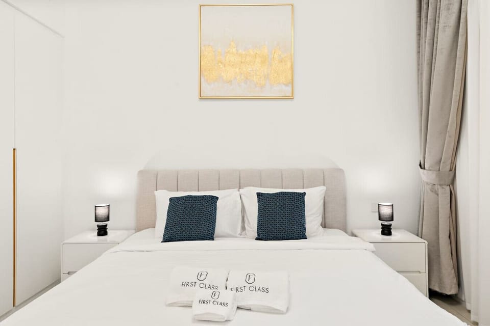 Bedroom: Elegant furnishings, soft lighting, and chic decor for ultimate relaxation.