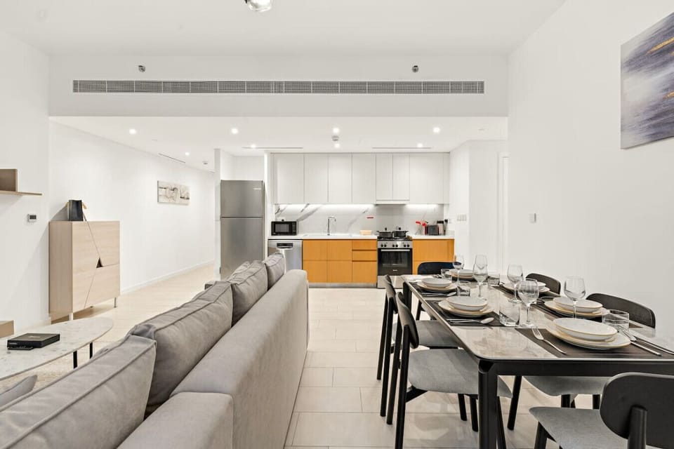 Chic Kitchen & Dining: Enjoy stylish meals in this spacious, modern dining area with luxe finishes!