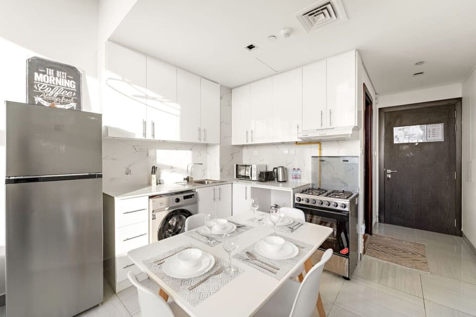 Kitchen: Whip up culinary delights in this stylish, modern kitchen complete with sleek appliances!