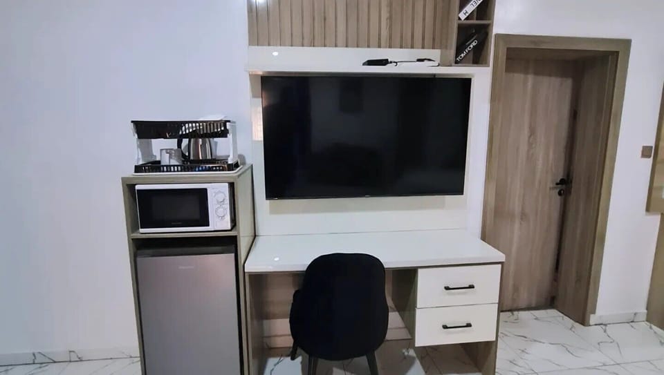 Family Apartment, Balcony, City View | 1 bedroom, desk, laptop workspace, blackout drapes