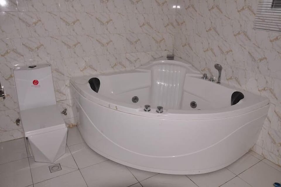 Economy Room, Balcony, City View | Bathroom | Free toiletries, hair dryer, towels, soap