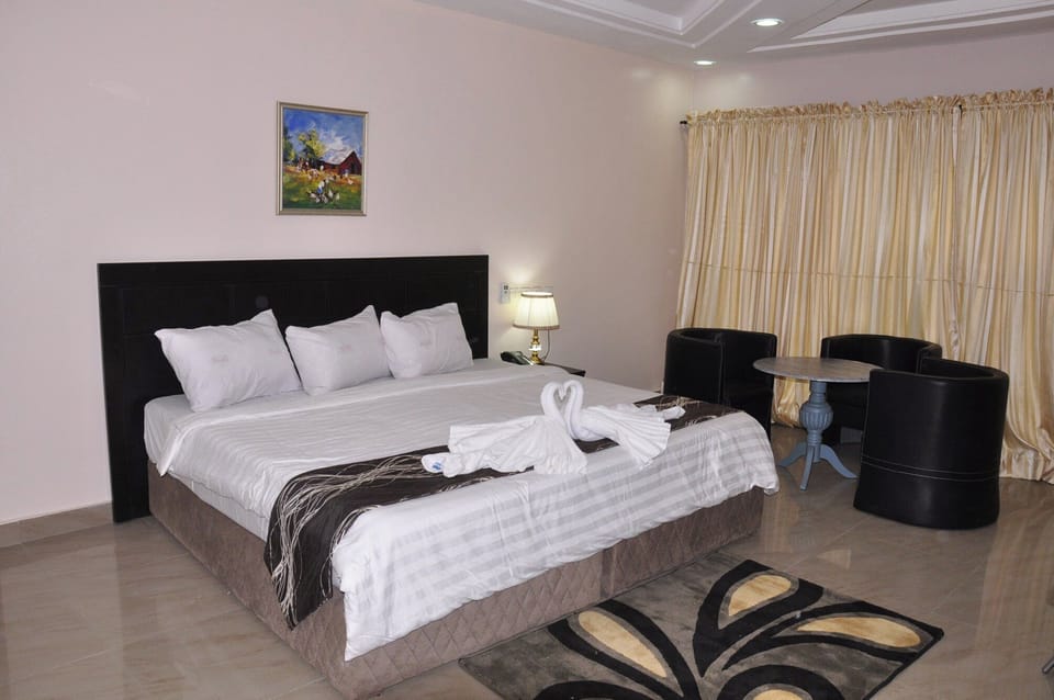 Economy Room, Balcony, City View | Desk, laptop workspace, blackout drapes, soundproofing