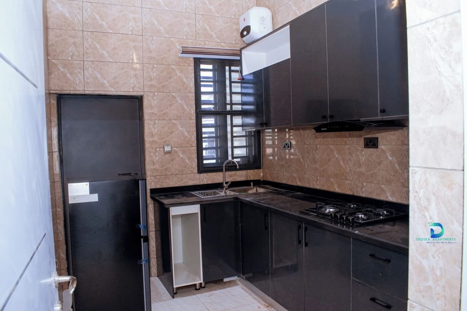Luxury Apartment, Balcony, City View | Private kitchen | Fridge, microwave, oven, stovetop