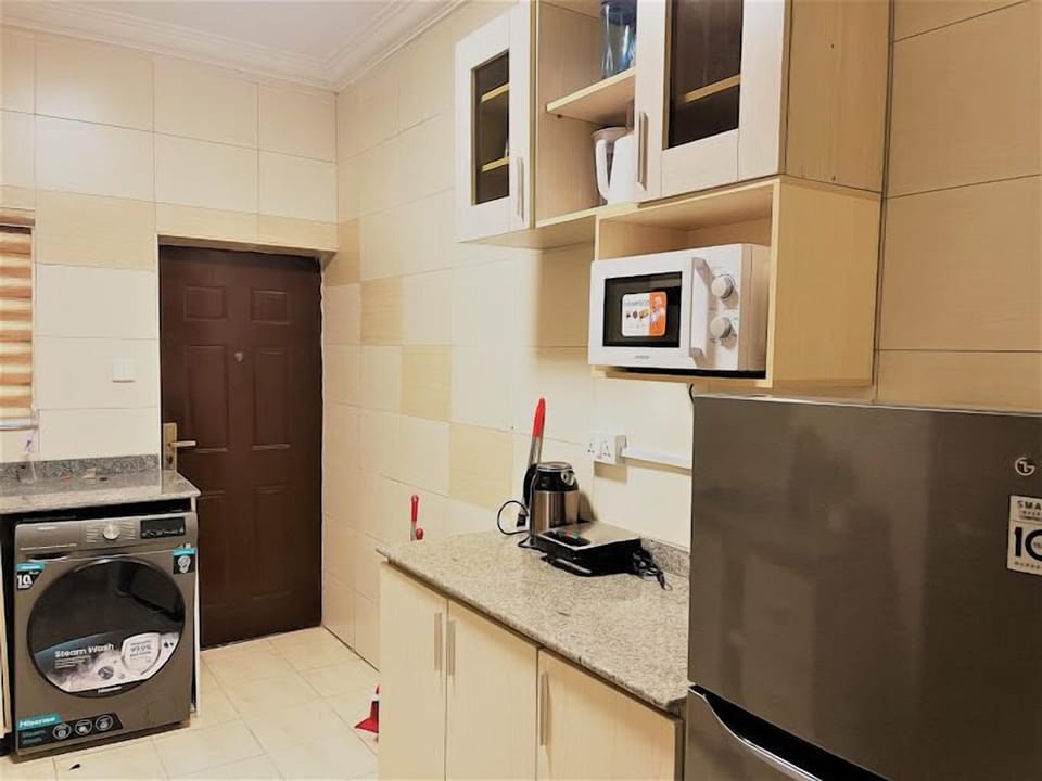 Standard Apartment, Balcony, City View | Private kitchen | Fridge, microwave, oven, stovetop