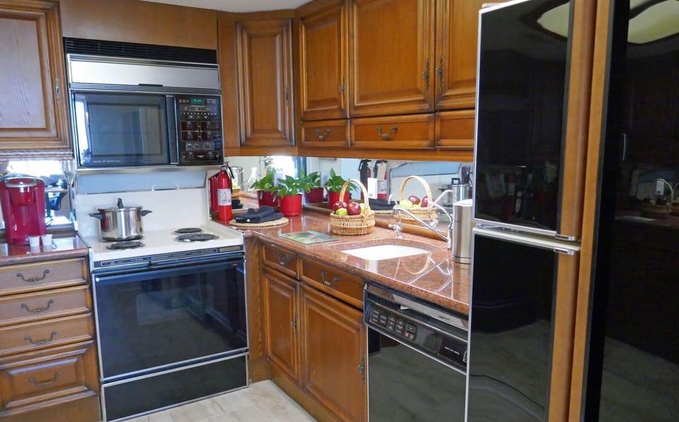 The kitchen has full-size appliances, accessories, dishes, pans and much more.