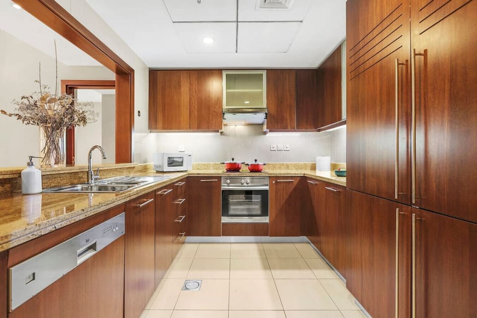 A bright and warm kitchen with all the essential appliances.
