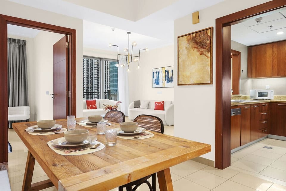 Dinner is served! Dining area opens to the stylish living room.