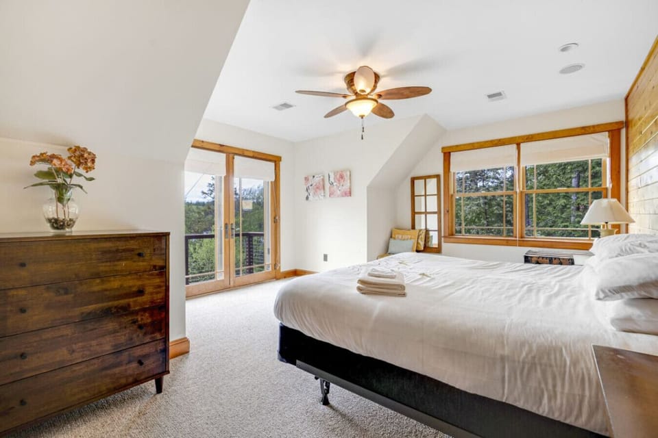 Wake up to sunlight and step out onto your own balcony surrounded by nature.