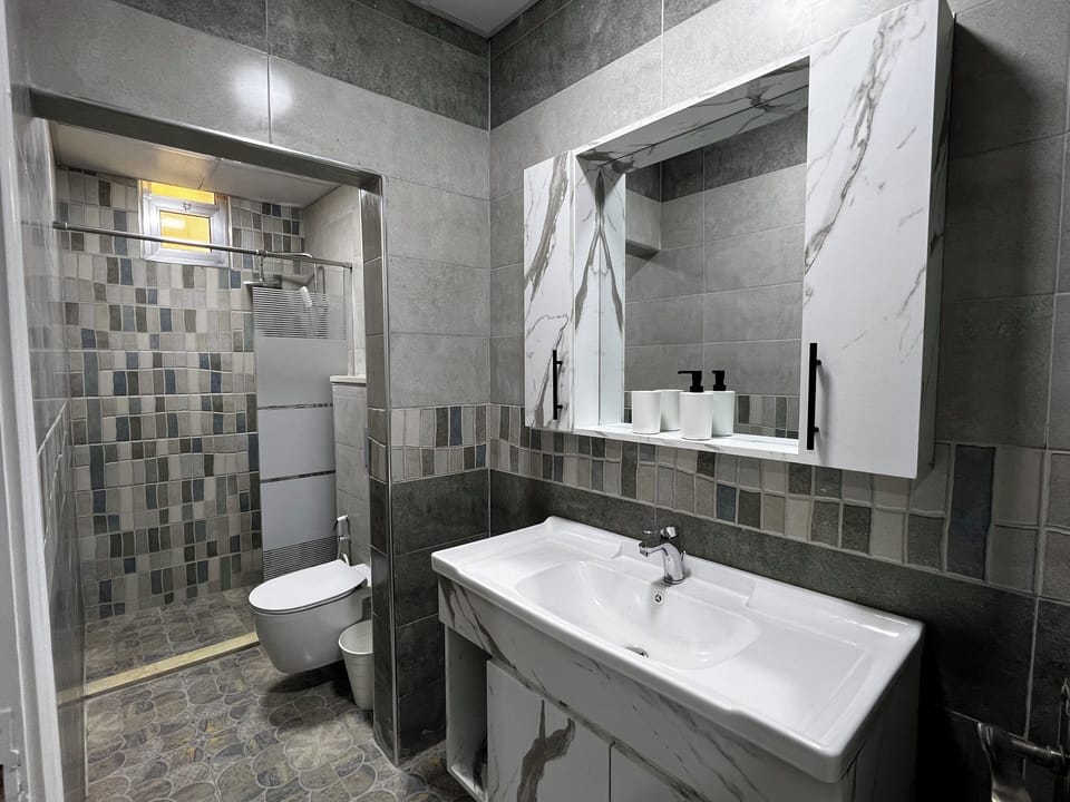 Shower, towels, soap, shampoo