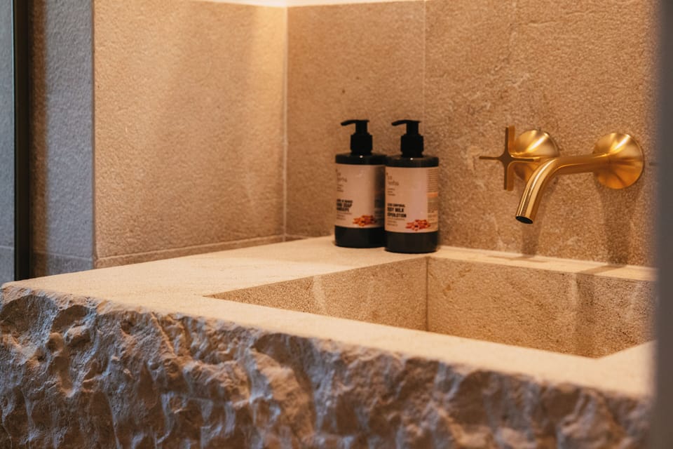 Junior Suite, Sea View | Bathroom | Hair dryer, bathrobes, slippers, towels