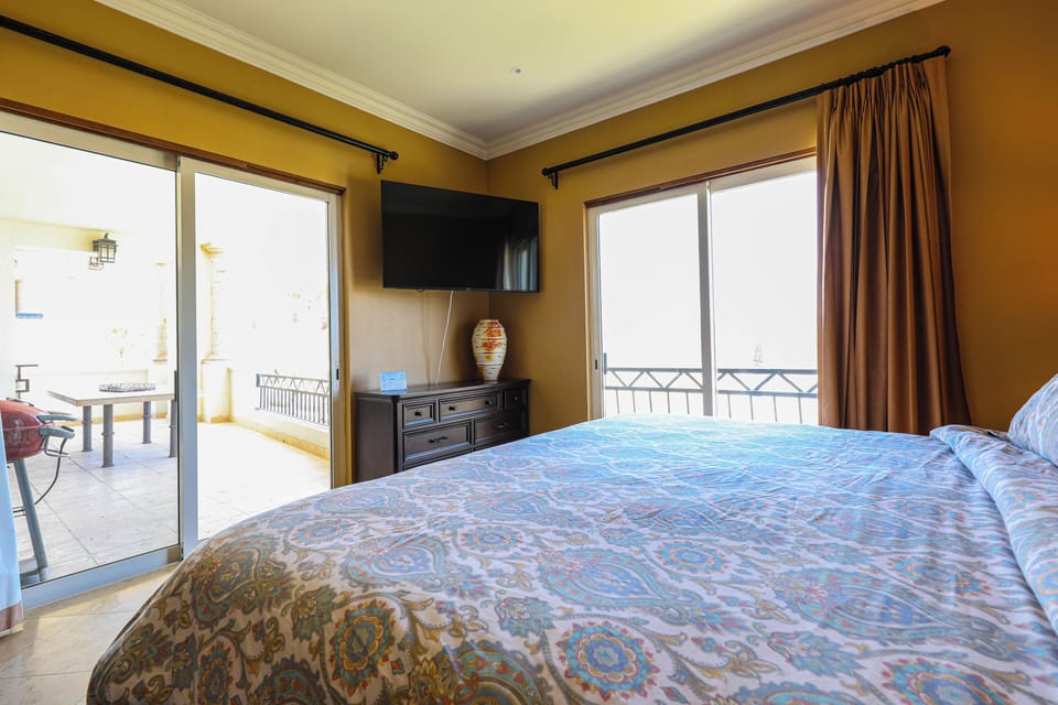 Master Bedroom with Smart Flat Screen TV