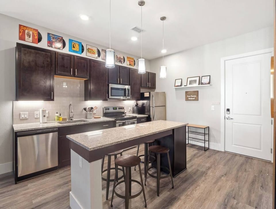 Spacious, open concept kitchen with everything you need for cooking! Keurig coffee maker. Pots, pans and baking dishes. Breakfast bar.