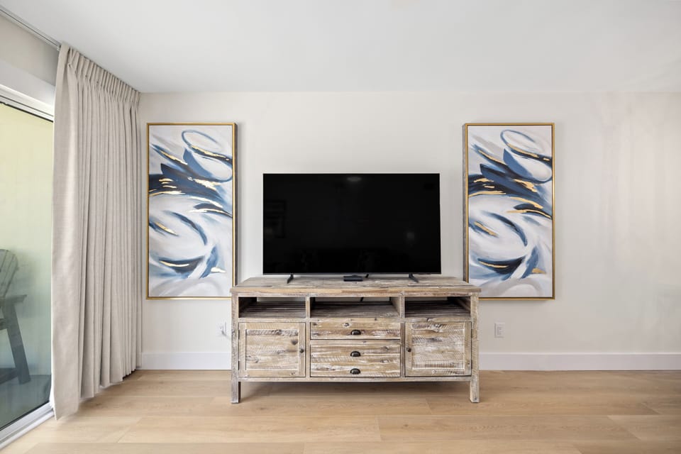 Living area with  brand new 65" smart TV!