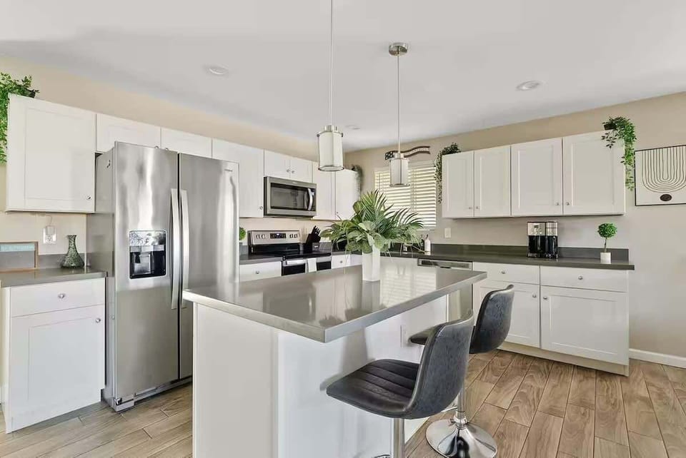 Kitchen: Included: Coffee/Kcups, Tea, creamers, sugar/sweetener Plastic and glass cups, outdoor beverage containers, coffee mugs Large cooking griddle, slow cookers, Large blender (ninja), pots, pans, cooking utensils, grilling utensils,
