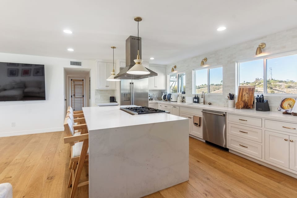 Fully stocked Chefs kitchen with high end Monogram appliances