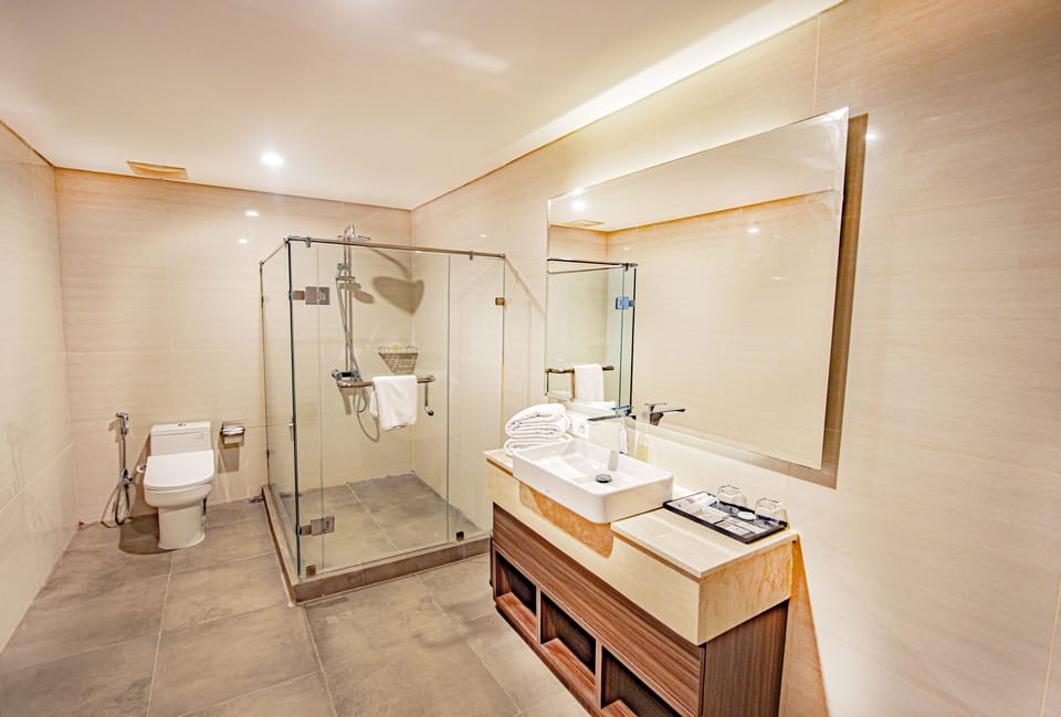 Slippers, bidet, towels, soap
