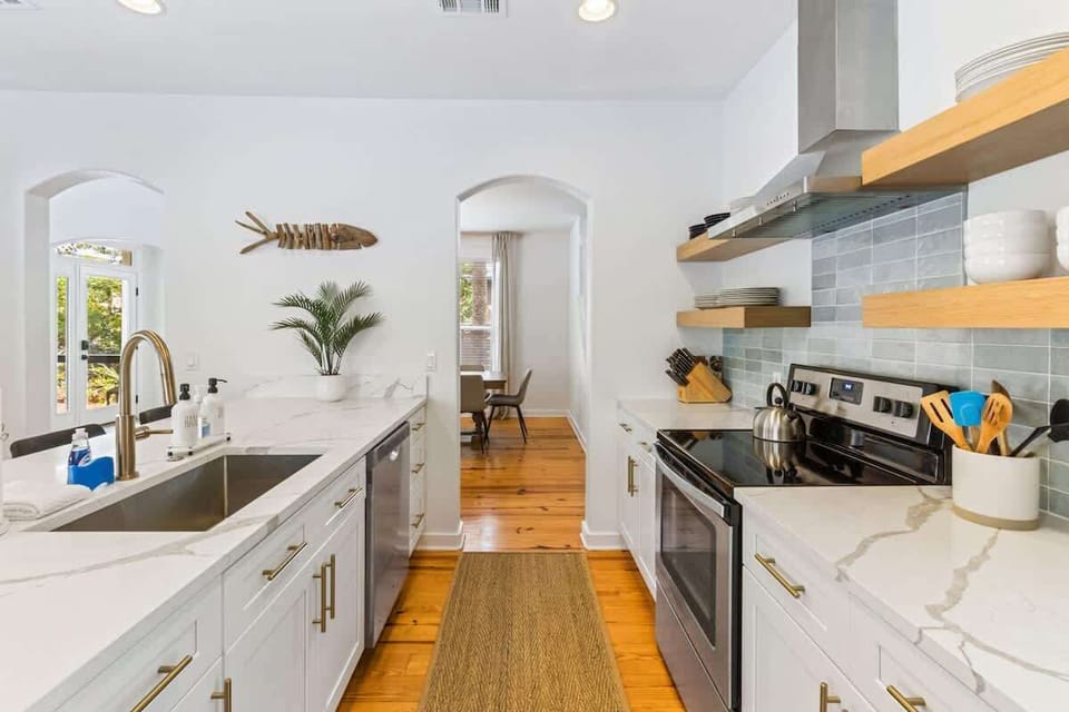 Cook, connect, and create together in this fully equipped kitchen with quartz countertops, stainless appliances, and plenty of space for family feasts.